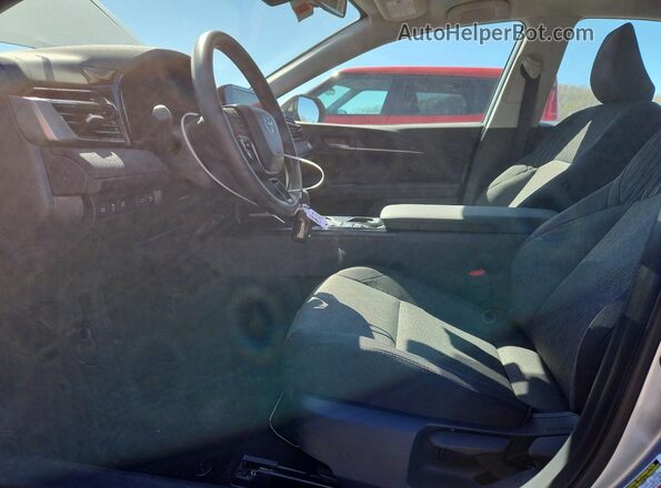 4T1DAACK6TU720977 2026 TOYOTA LE Серебряный Вид салона спереди