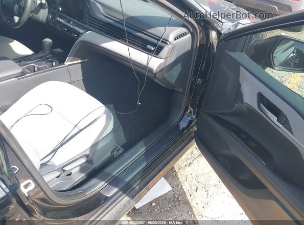 4T1DAACK7SU035756 2025 TOYOTA CAMRY Черный Вид салона спереди