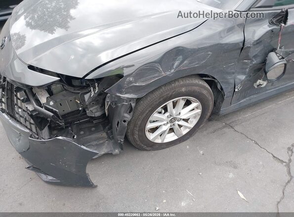 4T1DAACK7SU205503 2025 TOYOTA CAMRY Gray Front view
