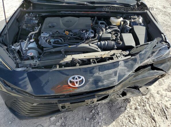 4T1DAACK9SU147037 2025 TOYOTA CAMRY Black Սալոնի հետևի տեսք