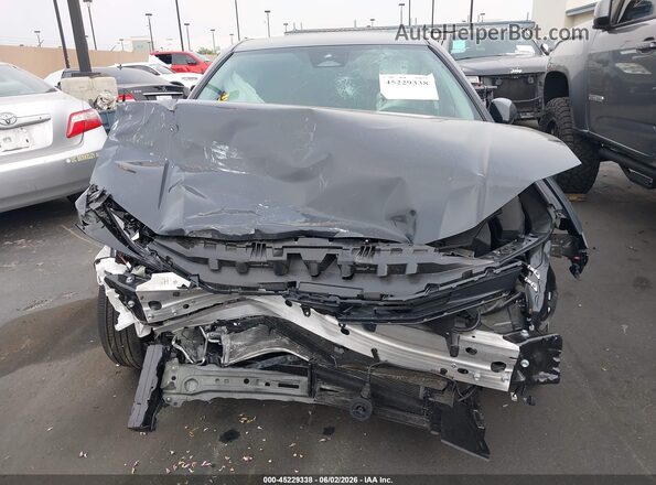 4T1DAACKXTU212334 2026 TOYOTA CAMRY Gray Вид задньої частини салону