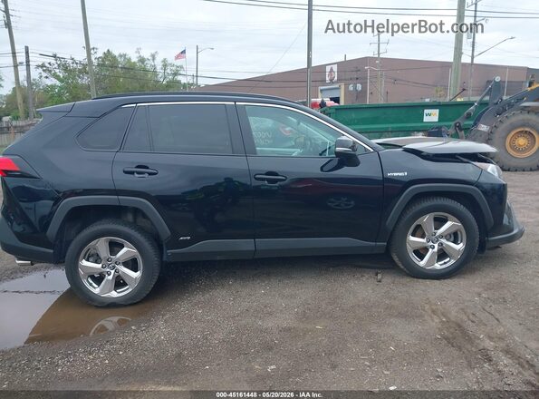 4T3B6RFV8MU007701 2021 TOYOTA RAV4 HYBRID Черный Вид задней части салона