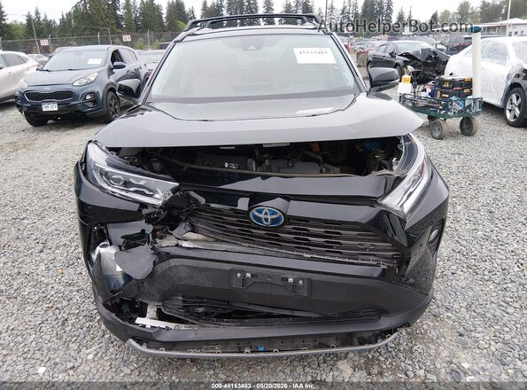 4T3D6RFV9MU060576 2021 TOYOTA RAV4 HYBRID Black ხელსაწყოთა პანელის ხედი