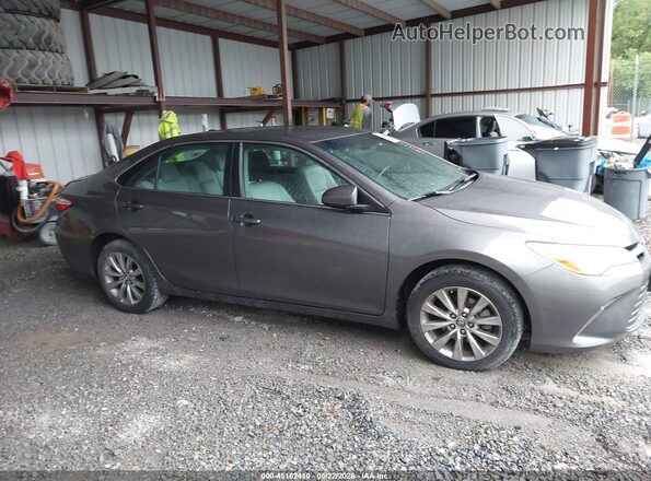 4T4BF1FK9GR520983 2016 TOYOTA CAMRY Black Vista interior trasera
