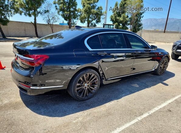 WBA7F0C59GGM20875 2016 BMW 7 SERIES Black Front right