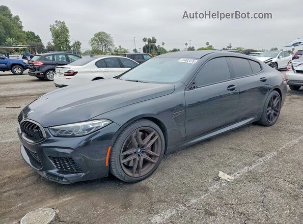 WBSGV0C02NCG90430 2022 BMW M8 Black Rear left