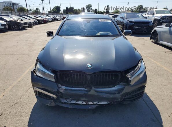 WBA7E4C51KGV28667 2019 BMW 7 SERIES Gray Вид ззаду
