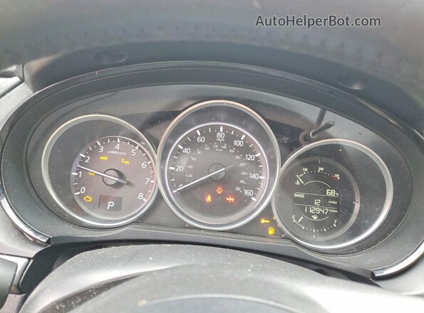 JM3TCBCY5H0135477 2017 MAZDA CX-9 Black Vista de los asientos traseros