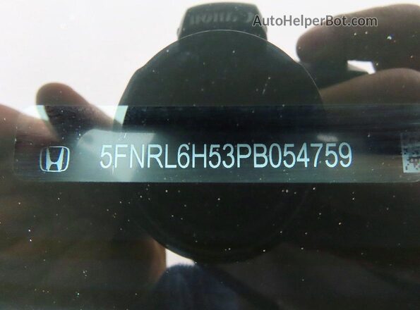 5FNRL6H53PB054759 2023 HONDA ODYSSEY Серый Вид задней части салона