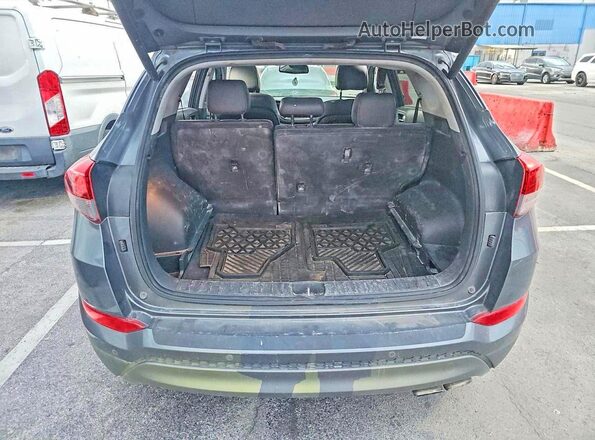 KM8J3CA28GU094821 2016 HYUNDAI TUCSON Gray 