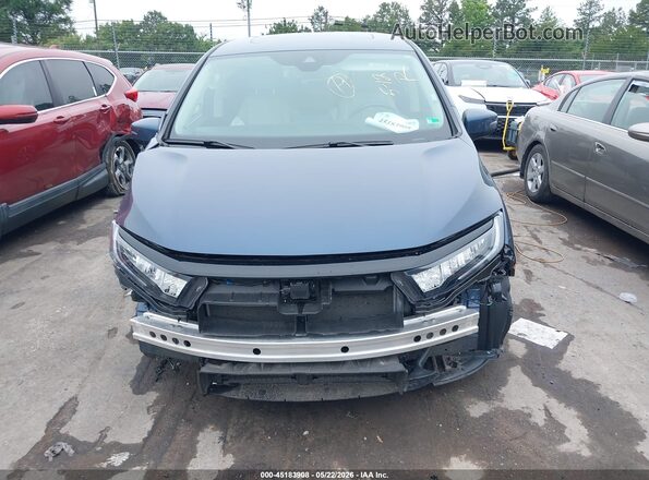 5FNRL6H60SB089129 2025 HONDA ODYSSEY Blue Vista interior trasera