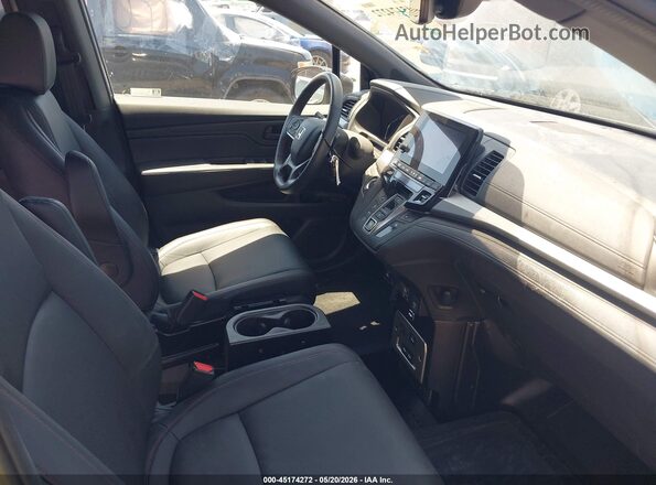 5FNRL6H72PB022368 2023 HONDA ODYSSEY Gray Front interior view