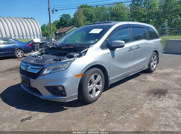 5FNRL6H76JB005743 2018 HONDA ODYSSEY Silver Առջևի ձախ երեք քառորդ տեսարան