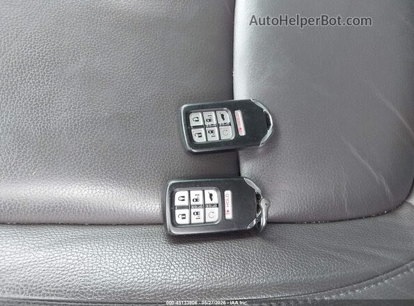 5FNRL6H7XJB046473 2018 HONDA ODYSSEY Silver Dashboard view