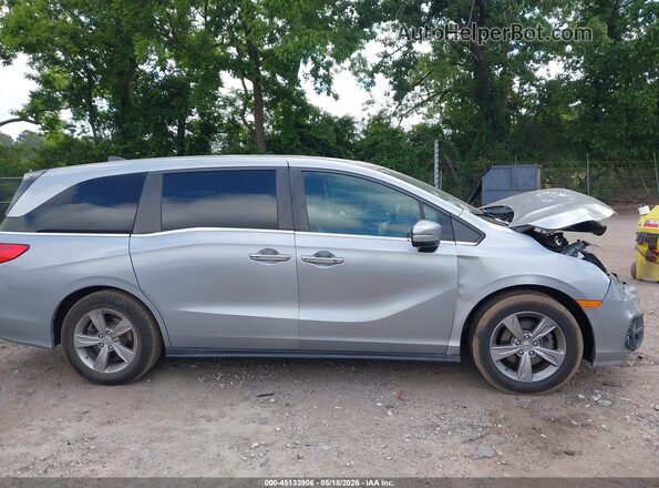 5FNRL6H7XJB046473 2018 HONDA ODYSSEY Silver Rear interior view