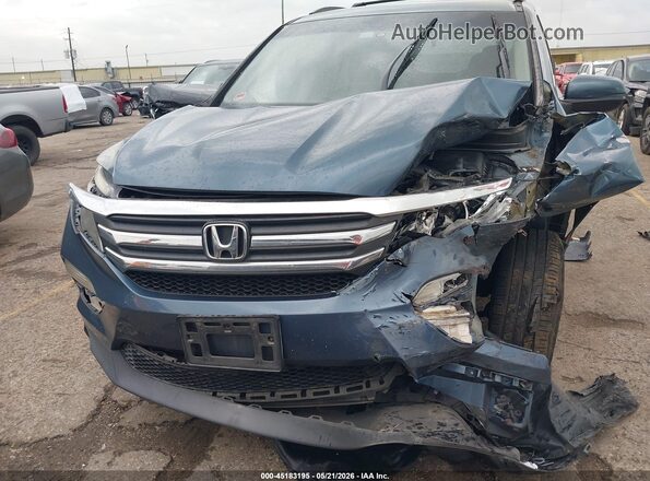 5FNYF5H38JB022053 2018 HONDA PILOT Blue Սալոնի հետևի տեսք