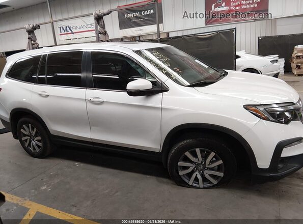 5FNYF5H50MB025678 2021 HONDA PILOT White Rear interior view