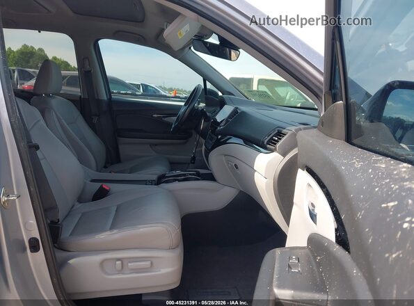 5FNYF5H64KB023101 2019 HONDA PILOT Silver Widok wnętrza z przodu
