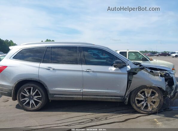 5FNYF5H64KB023101 2019 HONDA PILOT Silver Widok wnętrza z tyłu