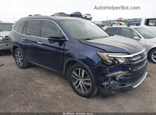 5FNYF5H94JB017016 2018 HONDA PILOT Dark Blue Widok wnętrza z tyłu