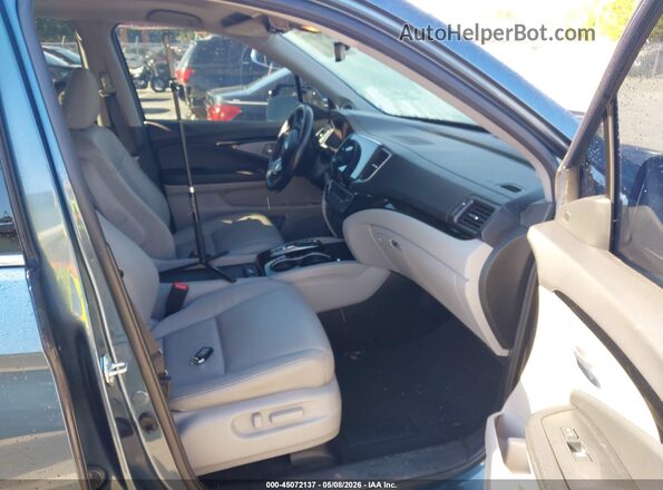 5FNYF5H97MB030010 2021 HONDA PILOT Blue Front interior view