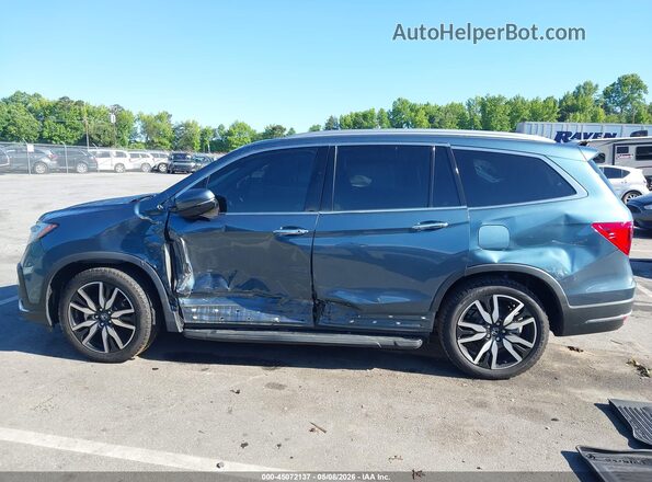 5FNYF5H97MB030010 2021 HONDA PILOT Blue 360 interior view