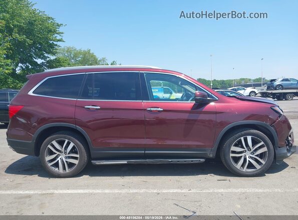 5FNYF6H04JB016827 2018 HONDA PILOT Maroon Rear interior view