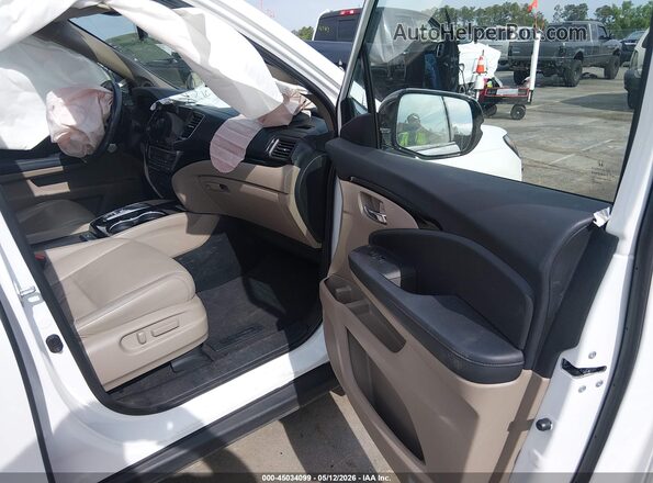 5FNYF6H07MB078081 2021 HONDA PILOT White Front interior view