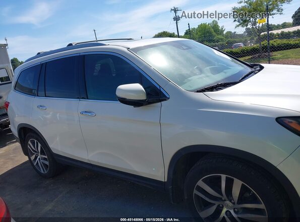 5FNYF6H09HB010905 2017 HONDA PILOT White Rear interior view