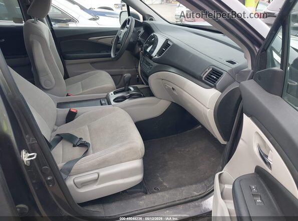5FNYF6H37KB083644 2019 HONDA PILOT Gray Front interior view