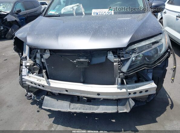 5FNYF6H3XMB057655 2021 HONDA PILOT Gray Rear interior view