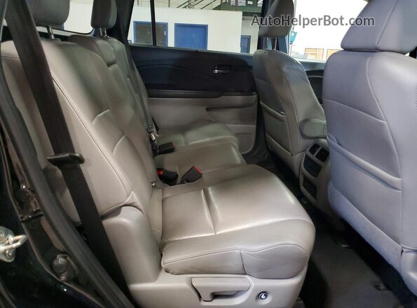5FNYF6H52KB047006 2019 HONDA PILOT Black Rear interior view
