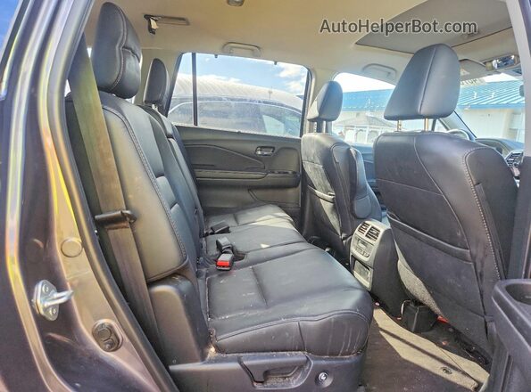 5FNYF6H53MB094807 2021 HONDA PILOT Gray Rear interior view