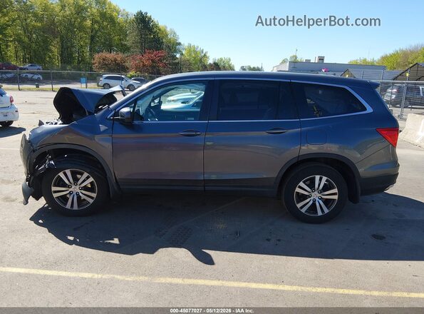 5FNYF6H56JB062011 2018 HONDA PILOT Gray Սալոնի հետևի տեսք
