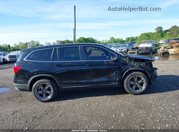 5FNYF6H57HB019081 2017 HONDA PILOT Black Widok wnętrza z tyłu