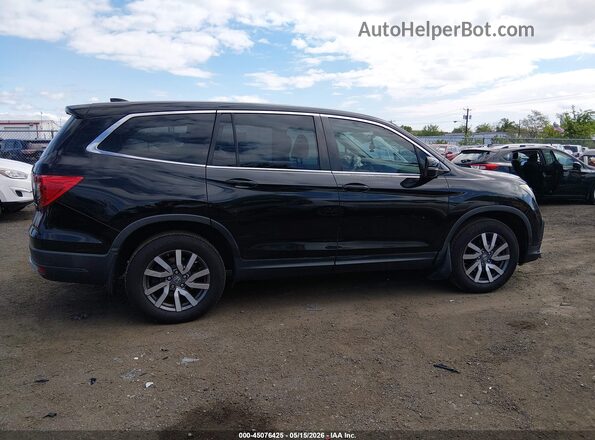 5FNYF6H57KB024692 2019 HONDA PILOT Черный Вид задней части салона