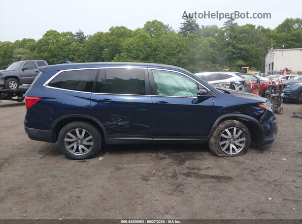 5FNYF6H57KB086898 2019 HONDA PILOT Blue Widok wnętrza z tyłu