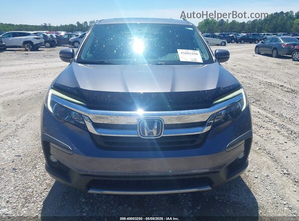 5FNYF6H5XKB078052 2019 HONDA PILOT Gray Widok wnętrza z tyłu