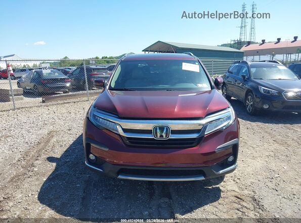 5FNYF6H63KB090388 2019 HONDA PILOT Burgundy Rear interior view