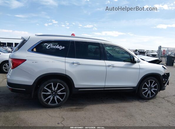 5FNYF6H63MB005875 2021 HONDA PILOT White Rear interior view