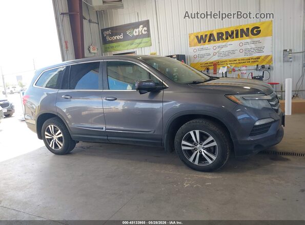 5FNYF6H64JB061979 2018 HONDA PILOT Silver Սալոնի հետևի տեսք