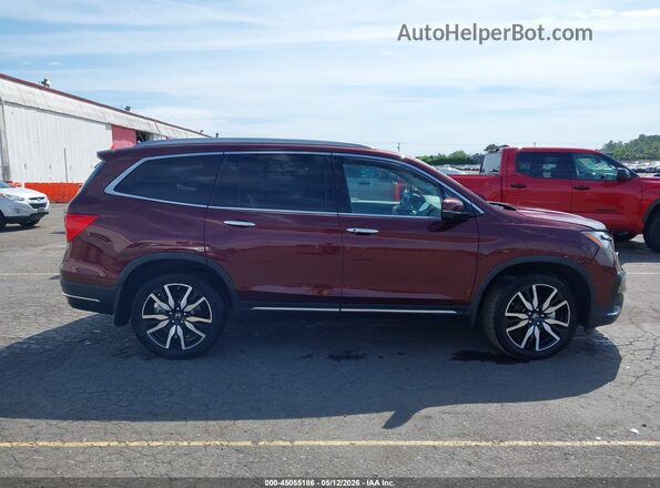 5FNYF6H68KB039257 2019 HONDA PILOT Maroon Rear interior view