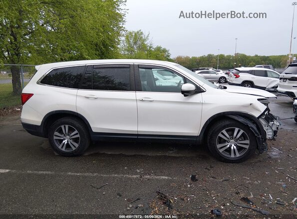 5FNYF6H71HB048223 2017 HONDA PILOT White Սալոնի հետևի տեսք