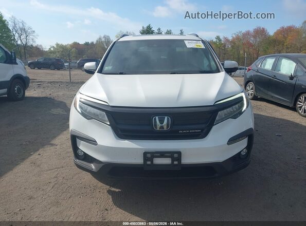 5FNYF6H76MB054674 2021 HONDA PILOT White Вид задньої частини салону