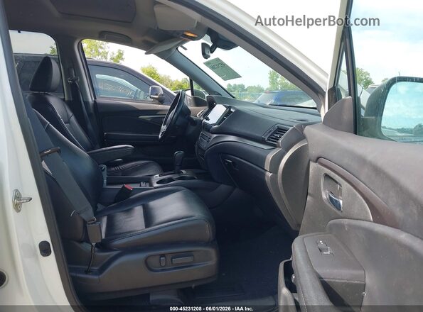 5FNYF6H79KB504539 2019 HONDA PILOT White Front interior view
