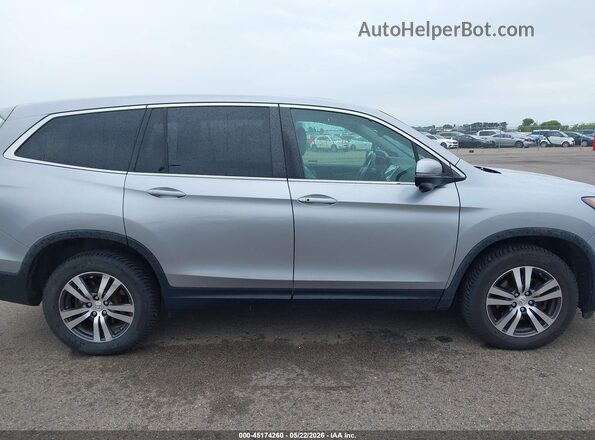 5FNYF6H82HB097794 2017 HONDA PILOT Silver Սալոնի հետևի տեսք