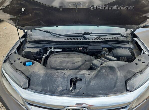 5FNYF6H96LB010058 2020 HONDA PILOT Silver Widok wnętrza z tyłu