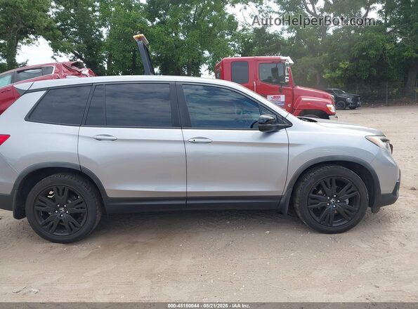5FNYF7H21KB004031 2019 HONDA PASSPORT Gray Vista interior trasera