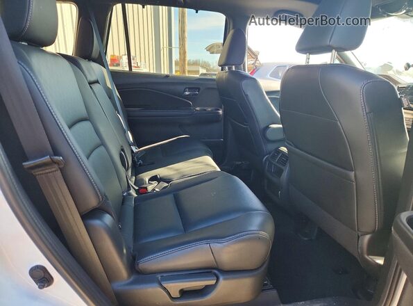 5FNYF7H50LB000404 2020 HONDA PASSPORT White Vista interior trasera