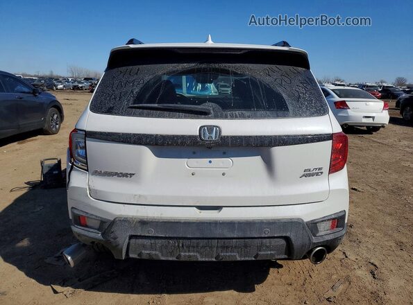 5FNYF8H02PB016037 2023 HONDA PASSPORT White Вид ззаду
